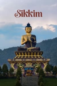 Giant Buddha statue overlooking the hills of Sikkim